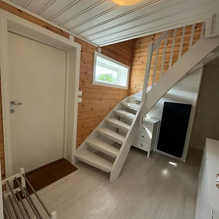 Апартаменты Koselig Gardshus Hjelmas