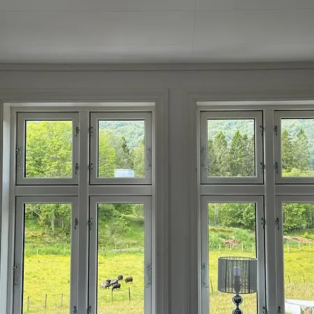 Koselig Gardshus Apartment Hjelmas